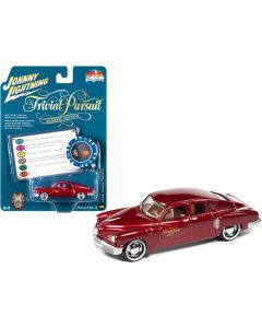 1948 Tucker Torpedo Red Maroon Metallic "Tucker: The Man and His Dream" (1988) Movie with Poker Chip (Collector Token) and Game Card "Trivial Pursuit" "Pop Culture" Series 3 1/64 Diecast Model Car by Johnny Lightning