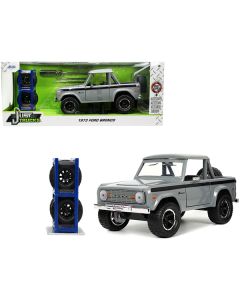 1973 Ford Bronco Pickup Truck Gray with Black Stripes with Extra Wheels "Just Trucks" Series 1/24 Diecast Model Car by Jada