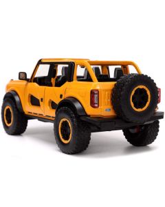 2021 Ford Bronco Orange Metallic with Extra Wheels "Just Trucks" Series 1/24 Diecast Model Car by Jada