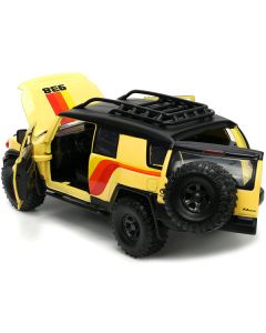 Toyota FJ Cruiser #938 Cream with Matt Black Top with Roof Rack and Stripes "KC Hilites" with Extra Wheels "Just Trucks" Series 1/24 Diecast Model Car by Jada