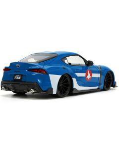 2020 Toyota Supra Blue with Graphics and Max Sterling Diecast Figurine "Robotech" "Hollywood Rides" Series 1/24 Diecast Model Car by Jada