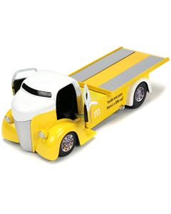 1947 Ford COE Flatbed Truck Yellow Metallic with White Top and Yellow M&M Diecast Figure 