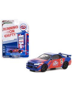 2002 Nissan Skyline GT-R (R34) #2 Blue with Red Graphics "STP" "Running on Empty" Series 15 1/64 Diecast Model Car by Greenlight