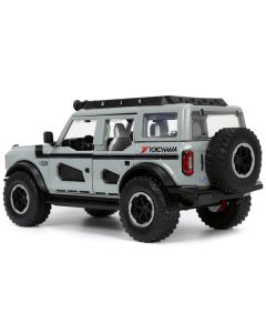 2021 Ford Bronco Gray with Black Stripes with Roof Rack "Own the Night" "Just Trucks" Series 1/24 Diecast Model Car by Jada