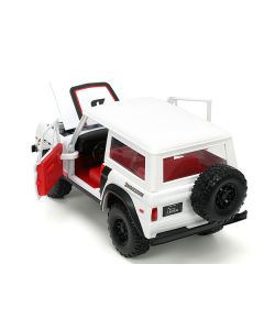 1973 Ford Bronco #008 White with Red and Black Stripes and Red Interior with Extra Wheels "Just Trucks" Series 1/24 Diecast Model Car by Jada