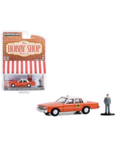 1981 Chevrolet Impala "Capitol Cab" Taxi Orange with White Top and Man in Suit Figure "The Hobby Shop" Series 15 1/64 Diecast Model Car by Greenlight