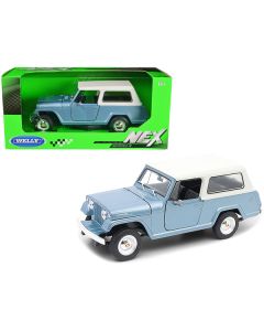 1967 Jeep Jeepster Commando Station Wagon Light Blue Metallic with White Top "NEX Models" Series 1/24 Diecast Model Car by Welly