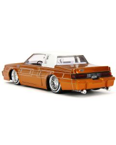 1987 Buick Grand National Orange Metallic with White Top and Interior "Bigtime Muscle" Series 1/24 Diecast Model Car by Jada