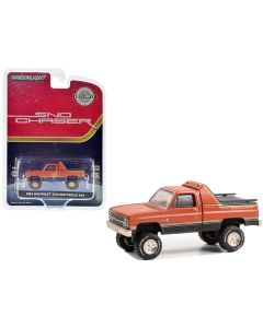 1984 Chevrolet K-10 Scottsdale 4x4 Pickup Truck Red and Black with Gold Stripes (Weathered) "Sno Chaser" "Hobby Exclusive" Series 1/64 Diecast Model Car by Greenlight