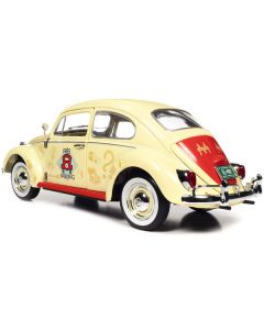 1963 Volkswagen Beetle Yukon Yellow with "Monopoly" Graphics "Free Parking" and Mr. Monopoly Resin Figure 1/18 Diecast Model Car by Auto World