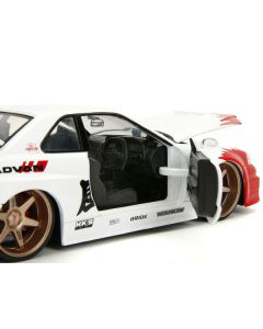 2002 Nissan Skyline GT-R (R34) RHD (Right Hand Drive) White with Red Graphics and Ryu Diecast Figure "Street Fighter" Video Game "Anime Hollywood Rides" Series 1/24 Diecast Model Car by Jada