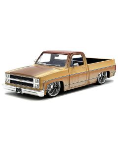 1985 Chevrolet C-10 Pickup Truck Yellow with Brown Top (Rusted) and Daytona Wire Wheels "Just Trucks" Series 1/24 Diecast Model Car by Jada